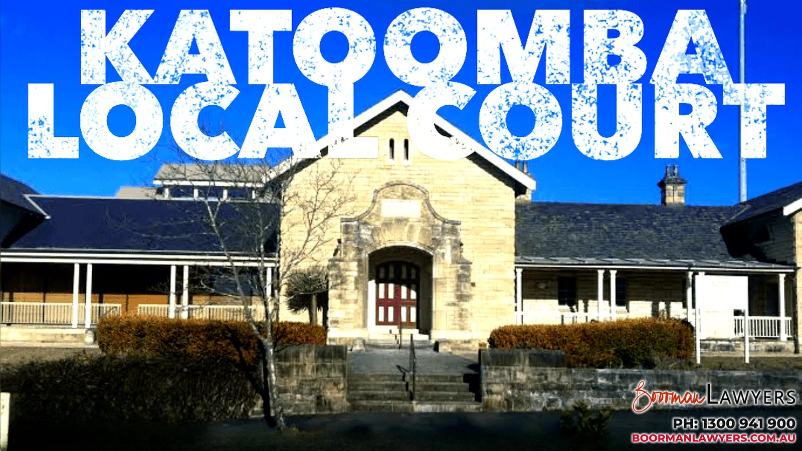 Katoomba Local Court, a sandstone courthouse with a gabled entrance, red doors and verandahs, with the Boorman Lawyers logo and phone number 1300 941 900